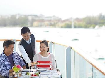 Couple dining onboard Holland America Cruise Line